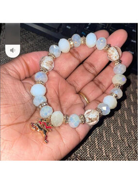 Opalite and gold beaded bracelet with a cute charm #boho #festival #bracelet #je